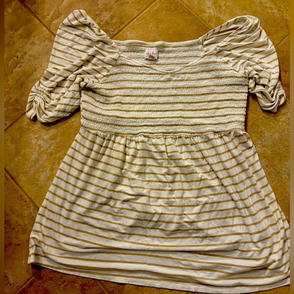 Striped maternity top with sweetheart neckline and ruched bust